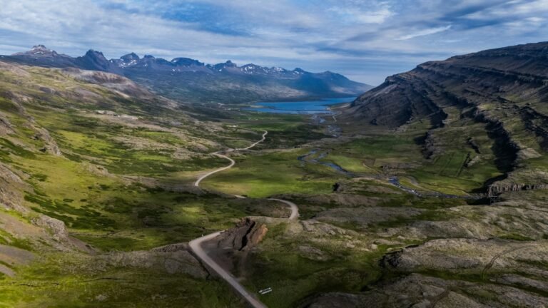 A winding road through the mountains of east Iceland, seen from above
